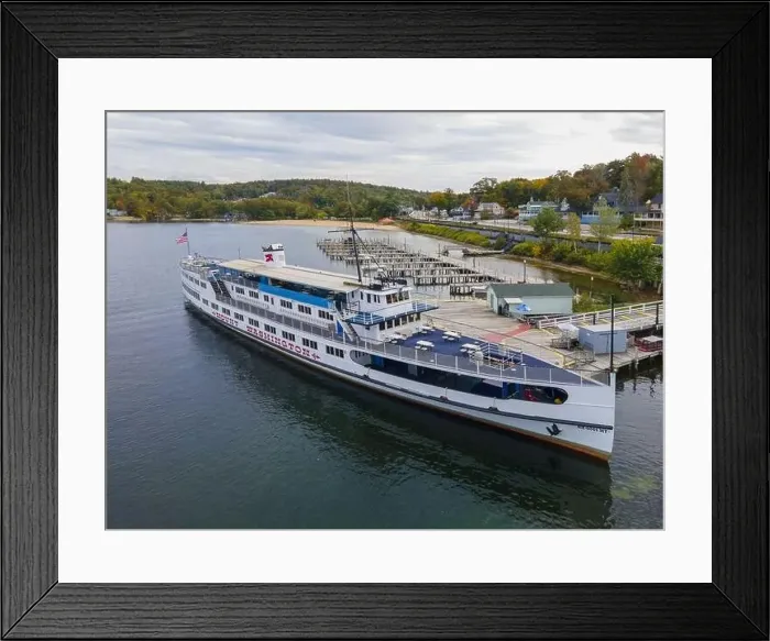 Framed Print : MS Mount Washington cruise ship docked at Weirs Beach port on Lake Winnipesaukee with fall foliage in City of Laconia