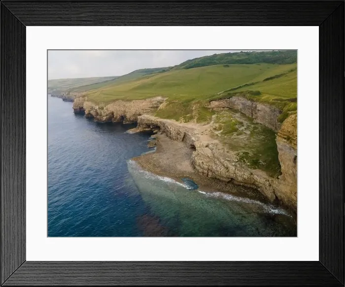 Framed Print : Aerial view of Jurassic Coast cliffs in Dorset, south west England Framed Print : Aerial view of Jurassic Coast cliffs in Dorset, south west England