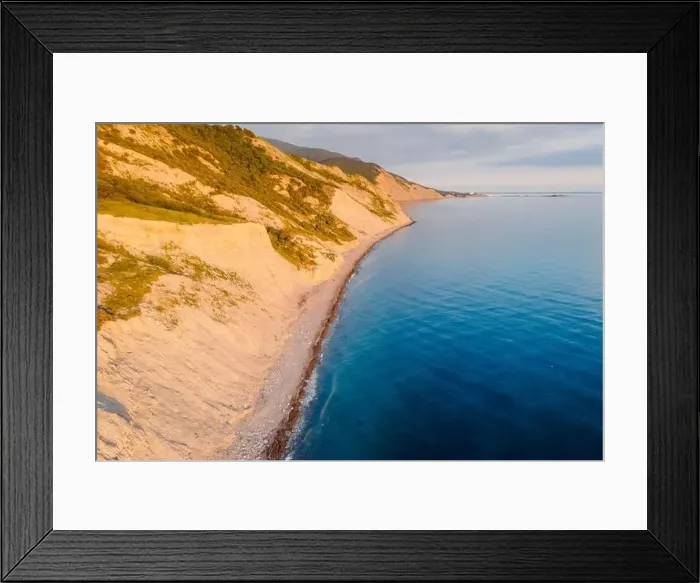 Framed Print : Aerial view of summer coastline with grass and sea. Coastline with sunset color Framed Print : Aerial view of summer coastline with grass and sea. Coastline with sunset color