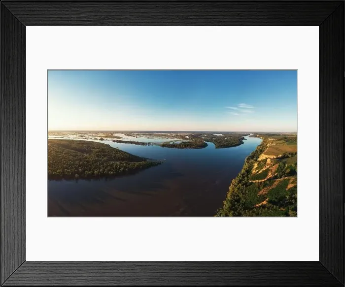 Framed Print : Aerial drone view of river landscape in sunny summer evening Framed Print : Aerial drone view of river landscape in sunny summer evening