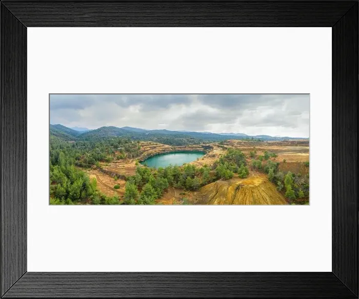 Framed Print : Restoration works in copper mining area with lake in open mine pit Framed Print : Restoration works in copper mining area with lake in open mine pit