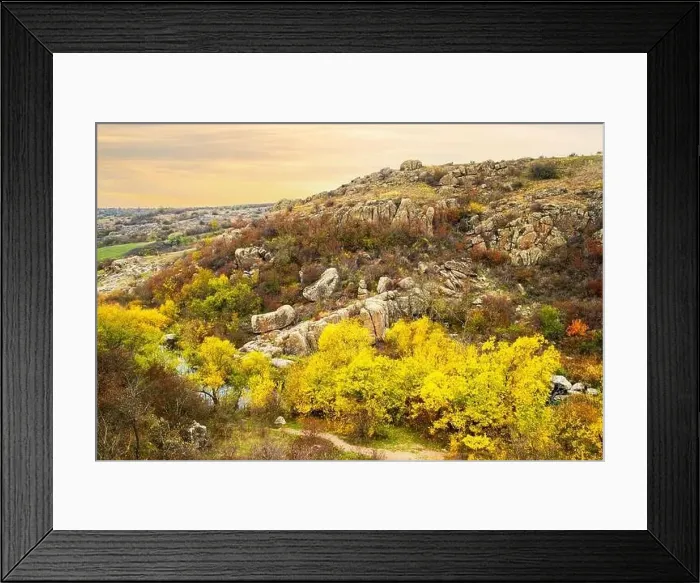Framed Print : Aktovsky Canyon, Ukraine. Autumn trees and large stone boulders around Framed Print : Aktovsky Canyon, Ukraine. Autumn trees and large stone boulders around