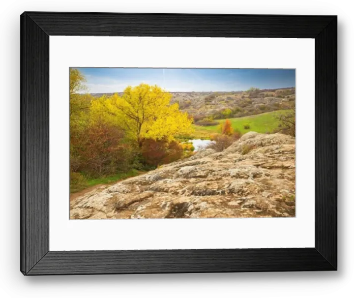 Framed Print : Aktovsky Canyon, Ukraine. Autumn trees and large stone boulders around Framed Print : Aktovsky Canyon, Ukraine. Autumn trees and large stone boulders around