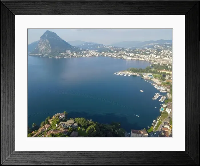 Framed Print : Drone view at Lugano and his lake in the italian part of Switzerland Framed Print : Drone view at Lugano and his lake in the italian part of Switzerland