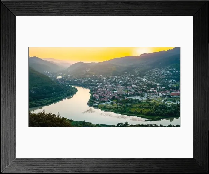 Framed Print : Aerial wide view historical former Georgia capital Mtskheta city with valley and river background Framed Print : Aerial wide view historical former Georgia capital Mtskheta city with valley and river background