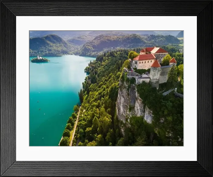 Framed Print : Bled Castle above Lake Bled in Slovenia in Summer. Aerial Drone View Framed Print : Bled Castle above Lake Bled in Slovenia in Summer. Aerial Drone View