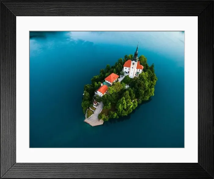 Framed Print : Famous Lake Bled with Church on Island in Slovenia. Drone View Framed Print : Famous Lake Bled with Church on Island in Slovenia. Drone View