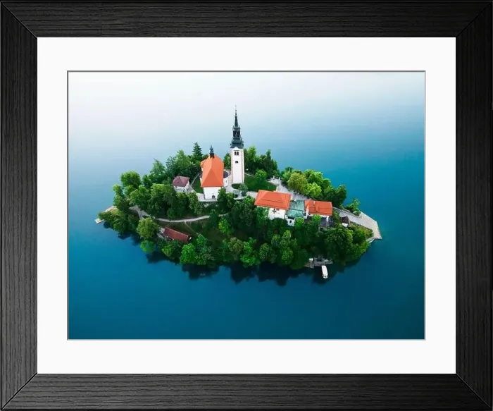 Framed Print : Drone View on Church on Island on Lake Bled in Slovenia at Summer Framed Print : Drone View on Church on Island on Lake Bled in Slovenia at Summer