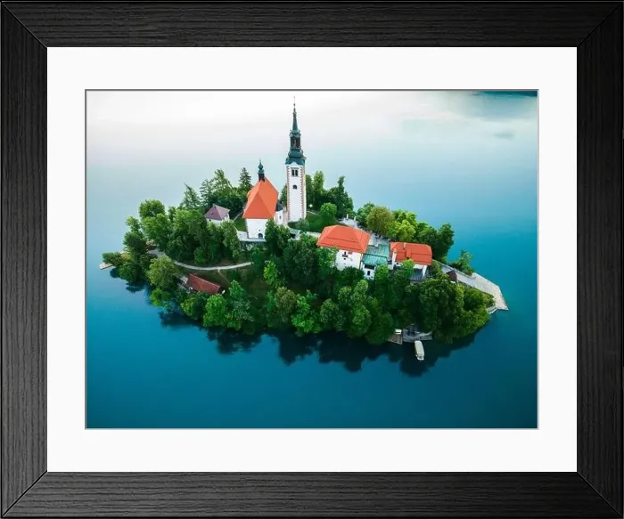 Framed Print : Famous Lake Bled with Church on Island in Slovenia. Drone View Framed Print : Famous Lake Bled with Church on Island in Slovenia. Drone View