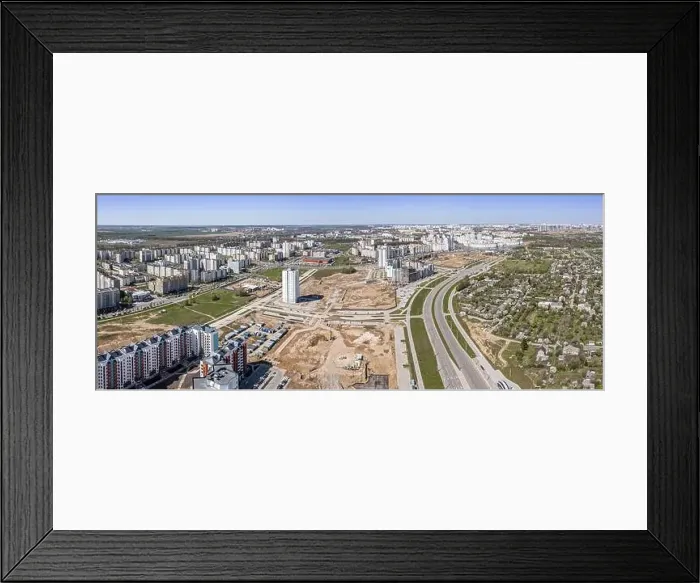 Framed Print : aerial panoramic view of city area under construction. blue sky, sunny summer day. drone photography Framed Print : aerial panoramic view of city area under construction. blue sky, sunny summer day. drone photography