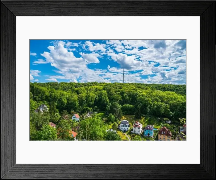 Framed Print : Germany, Stuttgart television tower building surrounded by green trees of forest on sunny day Framed Print : Germany, Stuttgart television tower building surrounded by green trees of forest on sunny day