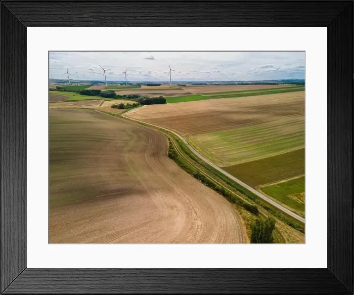 Framed Print : Renewable Energy Wind Farm in Agriculture Fields in Countryside Drone Aerial View Framed Print : Renewable Energy Wind Farm in Agriculture Fields in Countryside Drone Aerial View
