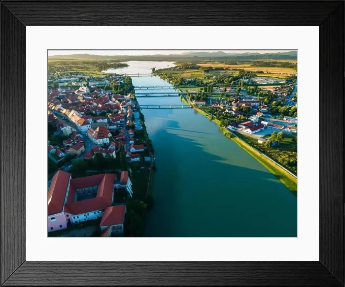 Framed Print : Drava River in Ptuj City, Slovenia. Aerial Drone View Framed Print : Drava River in Ptuj City, Slovenia. Aerial Drone View