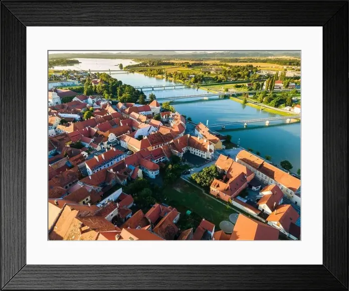 Framed Print : Ptuj at River Drava in Slovenia, Drone View Framed Print : Ptuj at River Drava in Slovenia, Drone View