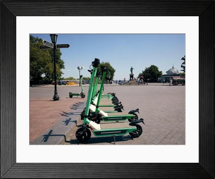 Framed Print : Electric scooter rental on Primorsky Boulevard near the Potemkin Stairs. Odessa, Ukraine Framed Print : Electric scooter rental on Primorsky Boulevard near the Potemkin Stairs. Odessa, Ukraine