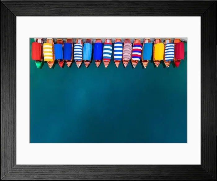 Framed Print : Row of Colorful Boats on Blue Lake. Top Down Drone View. Travel Background Framed Print : Row of Colorful Boats on Blue Lake. Top Down Drone View. Travel Background