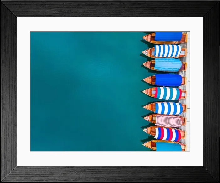 Framed Print : Travel Background. Colorful Boats on Lake Bled in Slovenia. Top Down Aerial View Framed Print : Travel Background. Colorful Boats on Lake Bled in Slovenia. Top Down Aerial View