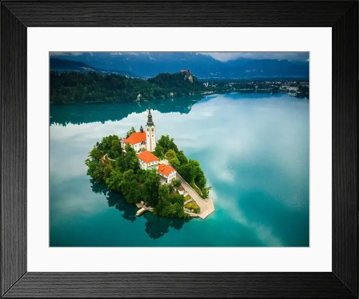 Framed Print : Famous Church on Iland Landmark on Lake Bled in Slovenia. Drone Aerial Photo Framed Print : Famous Church on Iland Landmark on Lake Bled in Slovenia. Drone Aerial Photo
