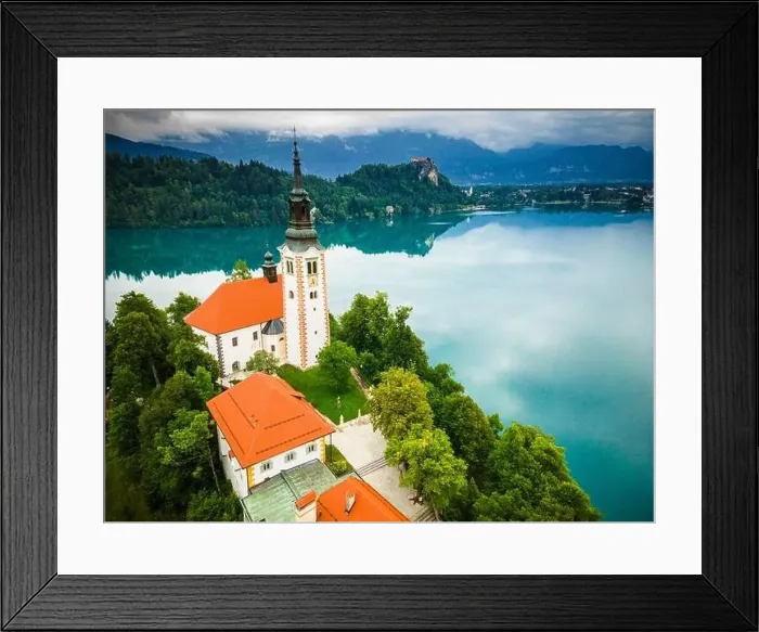 Framed Print : Famous Church on Iland Landmark on Lake Bled in Slovenia. Drone Aerial Photo Framed Print : Famous Church on Iland Landmark on Lake Bled in Slovenia. Drone Aerial Photo