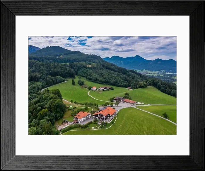 Framed Print : The Seiser Alm at the lake Chiemsee shot by a drone from above - the beautiful restaurant at the bavarian alps in Framed Print : The Seiser Alm at the lake Chiemsee shot by a drone from above - the beautiful restaurant at the bavarian alps in