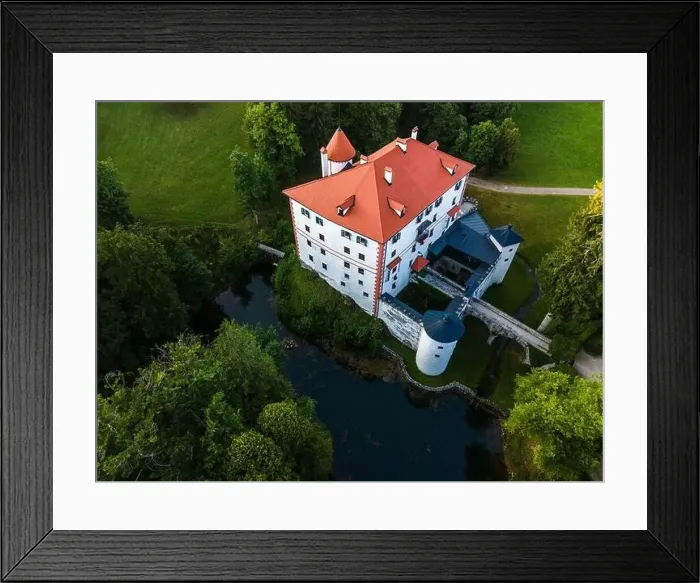 Framed Print : Sneznik Castle in Slovenia, Picturesque Flowing Castle in Park with Pond. Drone Aerial View Framed Print : Sneznik Castle in Slovenia, Picturesque Flowing Castle in Park with Pond. Drone Aerial View