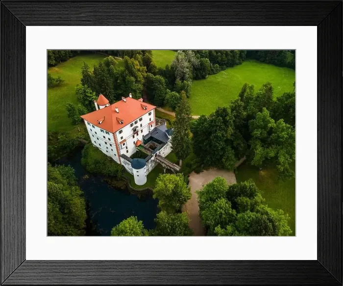 Framed Print : Sneznik Castle in Slovenia, Picturesque Flowing Castle in Park with Pond. Drone Aerial View Framed Print : Sneznik Castle in Slovenia, Picturesque Flowing Castle in Park with Pond. Drone Aerial View