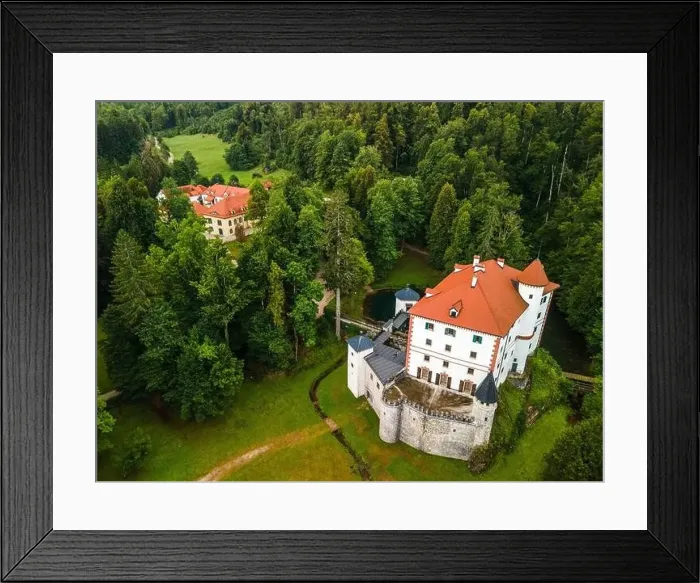 Framed Print : Sneznik Castle in Slovenia, Picturesque Flowing Castle in Park with Pond. Drone Aerial View Framed Print : Sneznik Castle in Slovenia, Picturesque Flowing Castle in Park with Pond. Drone Aerial View