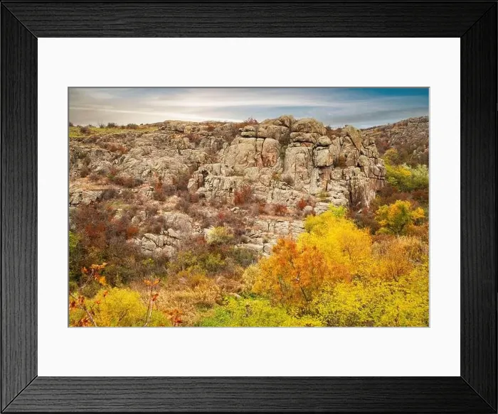 Framed Print : Aktovsky Canyon, Ukraine. Autumn trees and large stone boulders around Framed Print : Aktovsky Canyon, Ukraine. Autumn trees and large stone boulders around