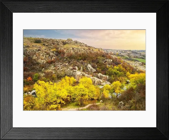 Framed Print : Aktovsky Canyon, Ukraine. Autumn trees and large stone boulders around Framed Print : Aktovsky Canyon, Ukraine. Autumn trees and large stone boulders around