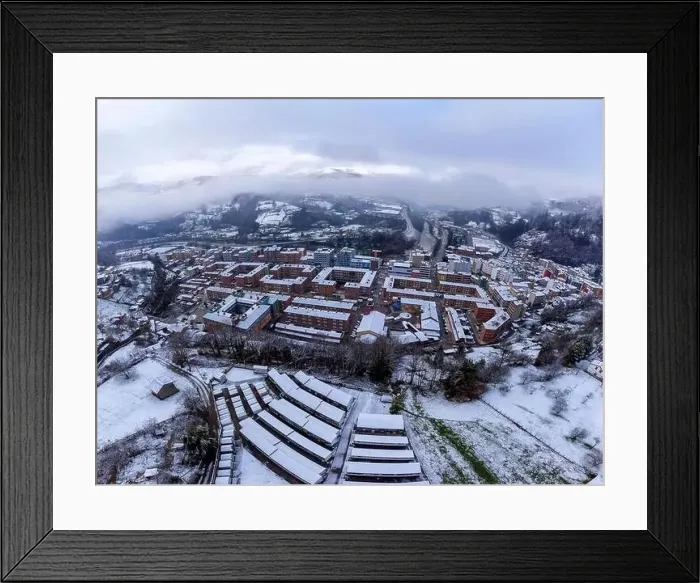 Framed Print : Aerial view of the Asturian town of Blimea under a snowfall, Spain Framed Print : Aerial view of the Asturian town of Blimea under a snowfall, Spain