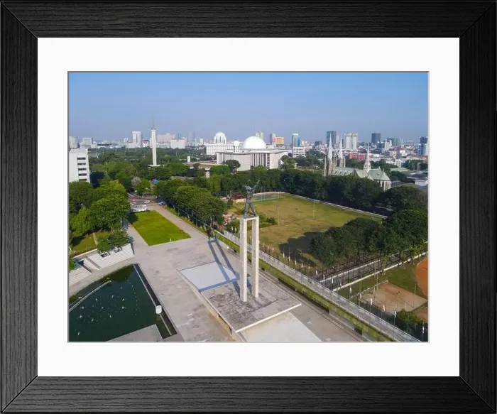 Framed Print : Aerial view of West Irian Liberation monument in downtown Jakarta with Jakarta cityscape Framed Print : Aerial view of West Irian Liberation monument in downtown Jakarta with Jakarta cityscape