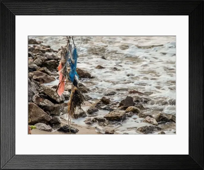 Framed Print : Rocks and sea : View of sea waves hitting rocks on the Calm beach in the morning. Selective focus Framed Print : Rocks and sea : View of sea waves hitting rocks on the Calm beach in the morning. Selective focus