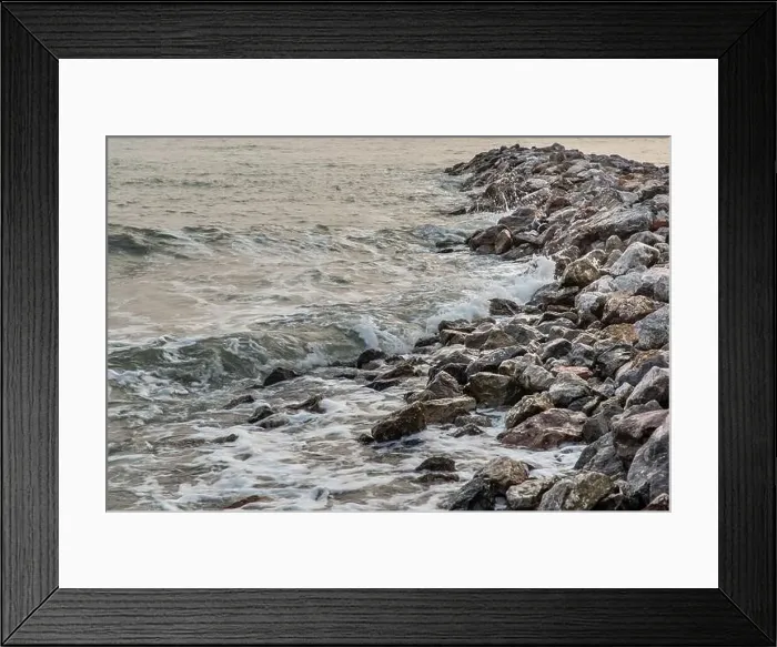 Framed Print : Rocks and sea : View of sea waves hitting rocks on the Calm beach in the morning. No focus, specifically Framed Print : Rocks and sea : View of sea waves hitting rocks on the Calm beach in the morning. No focus, specifically