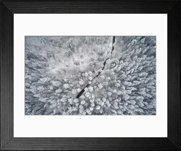 Framed Print : Curve shape rural road in winter landscape above top drone view Framed Print : Curve shape rural road in winter landscape above top drone view