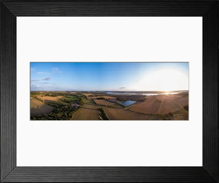 Framed Print : Aerial panoramic of the Suffolk countryside showing a wide range of different agricultural fields that have been Framed Print : Aerial panoramic of the Suffolk countryside showing a wide range of different agricultural fields that have been