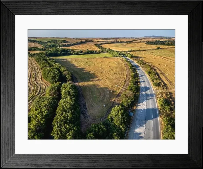 Framed Print : Road crossing the farmlands in eastern Bulgaria Framed Print : Road crossing the farmlands in eastern Bulgaria