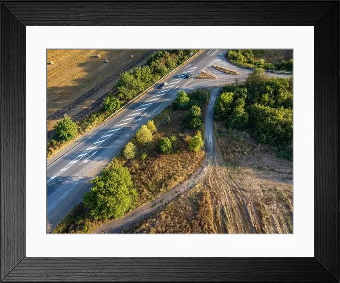 Framed Print : Road crossing the farmlands in eastern Bulgaria Framed Print : Road crossing the farmlands in eastern Bulgaria
