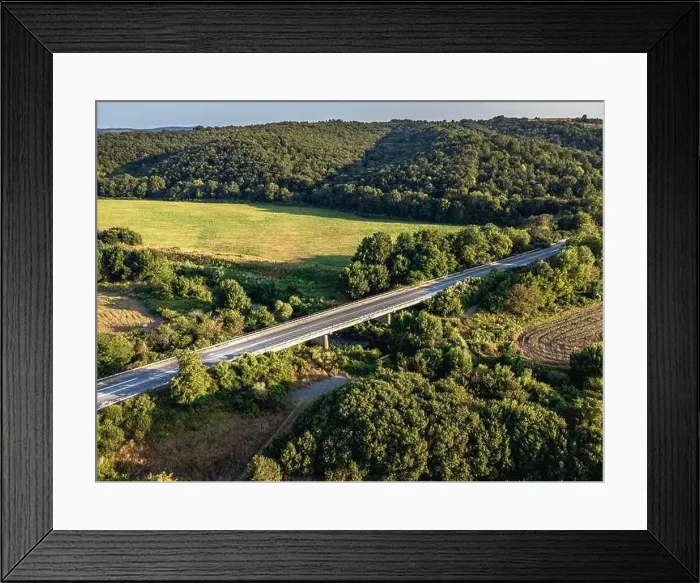 Framed Print : Road crossing the farmlands in eastern Bulgaria Framed Print : Road crossing the farmlands in eastern Bulgaria