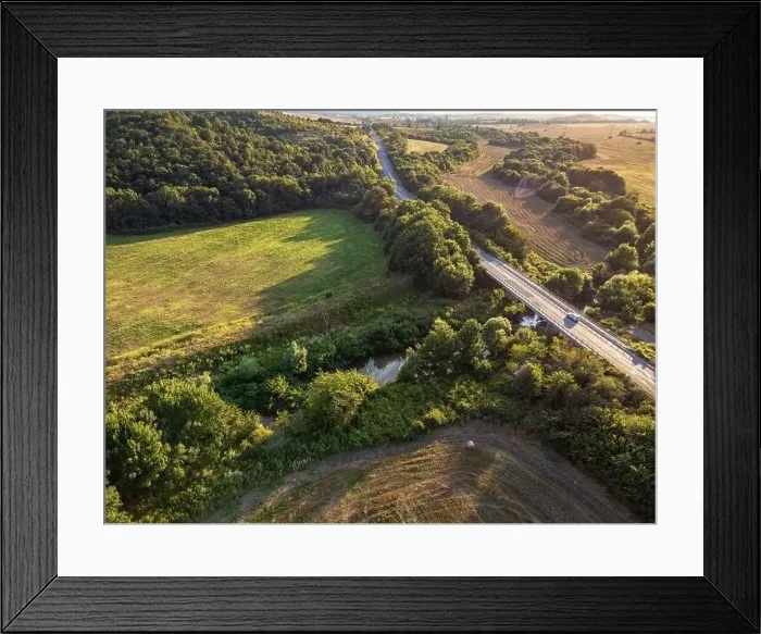 Framed Print : Road crossing the farmlands in eastern Bulgaria Framed Print : Road crossing the farmlands in eastern Bulgaria