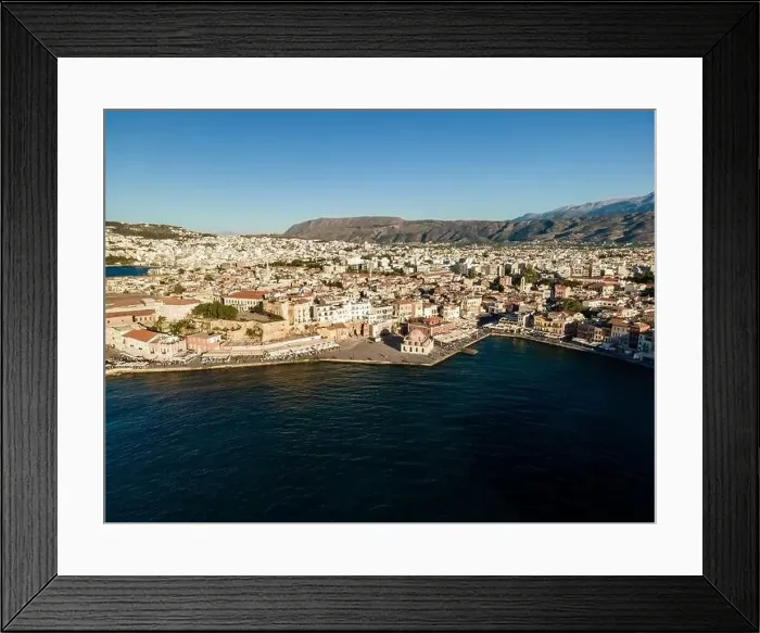 Framed Print : Chania, Greece - May 21, 2021: Aerial top view by drone of Chania city, Crete island, Greece Framed Print : Chania, Greece - May 21, 2021: Aerial top view by drone of Chania city, Crete island, Greece