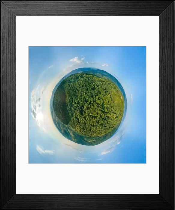 Framed Print : Little planet globe with dark mountain hills covered with green mixed pine Framed Print : Little planet globe with dark mountain hills covered with green mixed pine