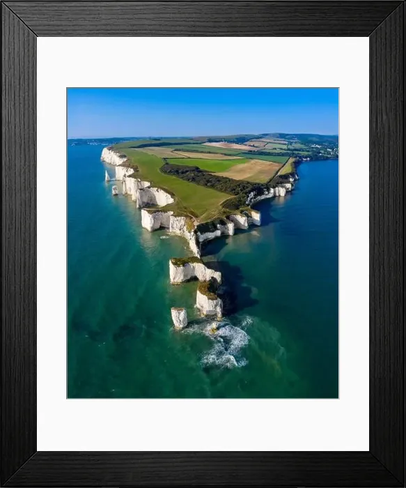 Framed Print : Sunrise catches Old Harry Rocks along the Jurassic Coast. Dorset. Aerial Drone Image Framed Print : Sunrise catches Old Harry Rocks along the Jurassic Coast. Dorset. Aerial Drone Image