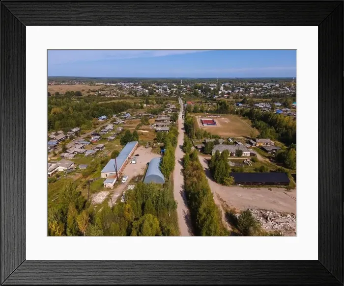 Framed Print : Road between lush trees and houses in autumn Framed Print : Road between lush trees and houses in autumn