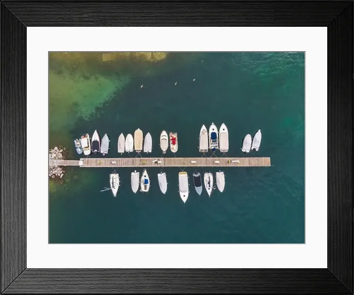 Framed Print : A top view of fishing boats anchoring in marina next to jetty wooden pier Framed Print : A top view of fishing boats anchoring in marina next to jetty wooden pier