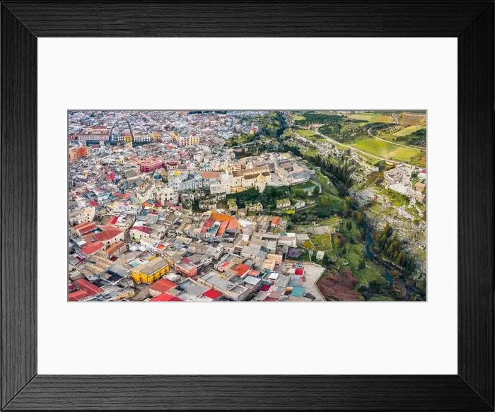 Framed Print : View from flying drone. Aerial morning cityscape of Gravina in Puglia tovn Framed Print : View from flying drone. Aerial morning cityscape of Gravina in Puglia tovn