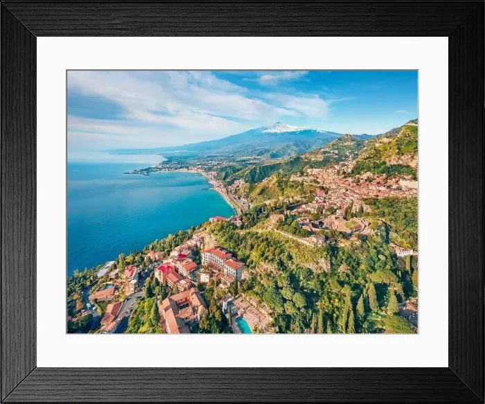 Framed Print : View from flying drone. Sunny morning view of Taormina town and Etna volcano on background Framed Print : View from flying drone. Sunny morning view of Taormina town and Etna volcano on background