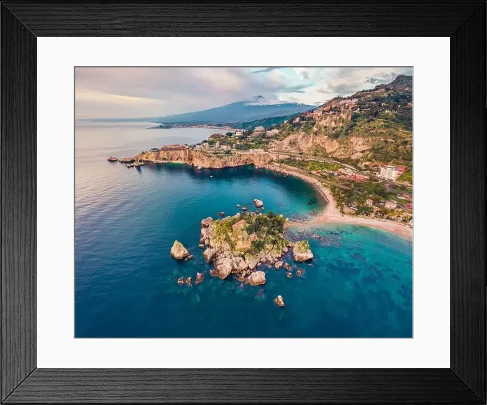 Framed Print : View from flying drone. Breathtaking morning view of Bella island and Etna volcano on background Framed Print : View from flying drone. Breathtaking morning view of Bella island and Etna volcano on background
