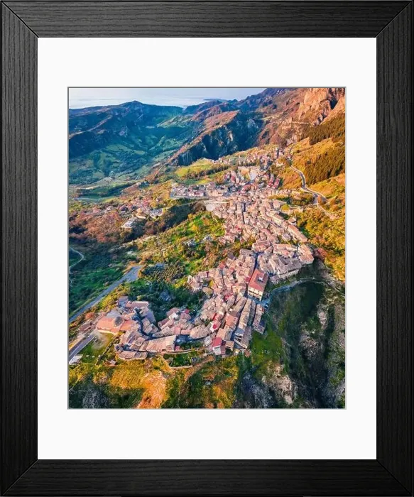 Framed Print : View from flying drone. Bright morning cityscape of Stilo town Framed Print : View from flying drone. Bright morning cityscape of Stilo town