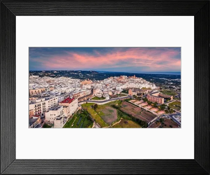 Framed Print : View from flying drone. Unbelievable spring sunrise in Ostuni town Framed Print : View from flying drone. Unbelievable spring sunrise in Ostuni town