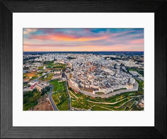 Framed Print : View from flying drone. Splendid morning cityscape of Ostuni town Framed Print : View from flying drone. Splendid morning cityscape of Ostuni town